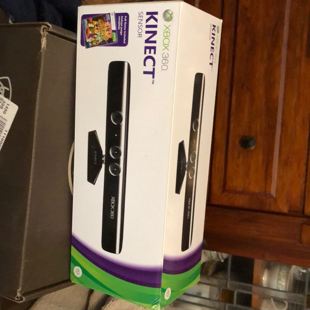 Xbox 360 Kinect with 3 games.